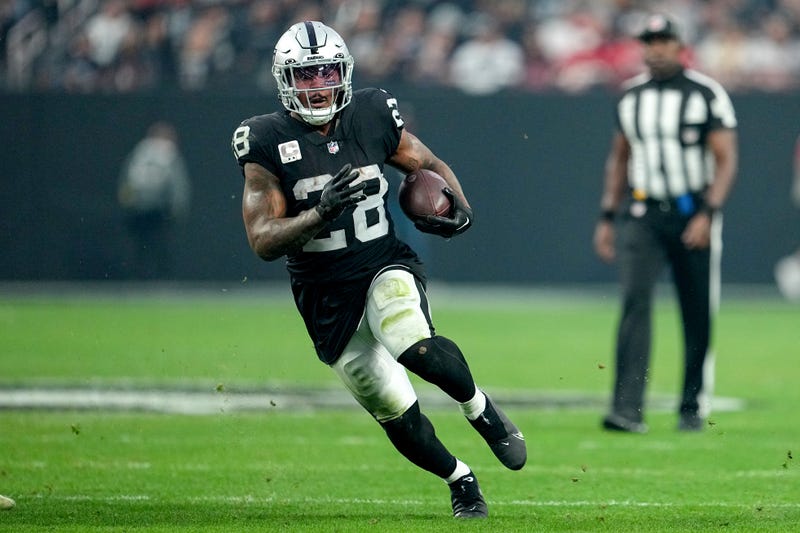 Josh Jacobs has ended his holdout and will report to Raiders camp and reportedly will be ready to play in the team's opener.