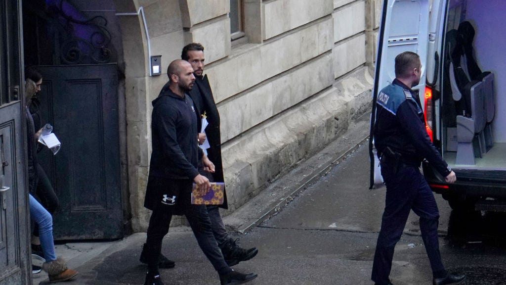 Andrew Tate charged with rape and human trafficking in Romania