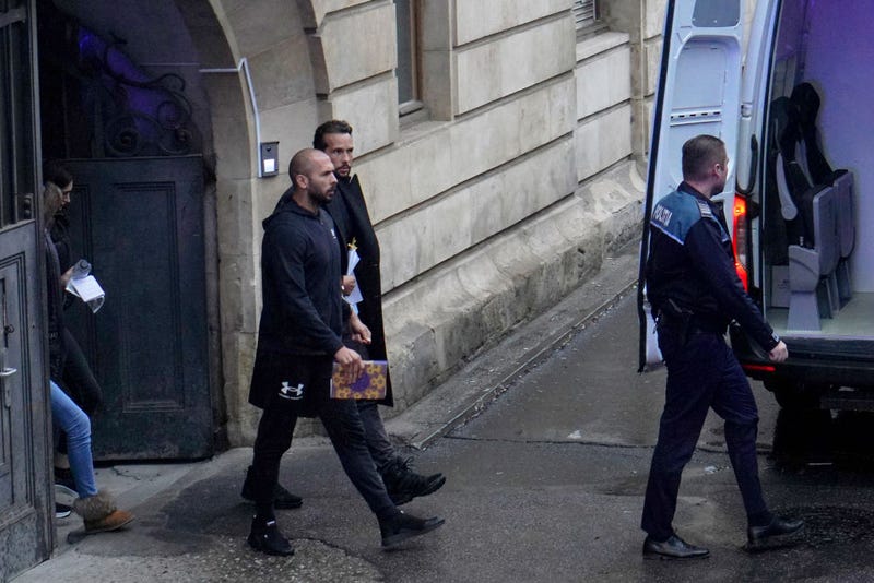 Andrew Tate (L) and Tristan Tate leave the Bucharest Court of Appeal after the hearing on their appeal to the decision of arrest for 30 days, on January 10, 2023 in Bucharest, Romania.