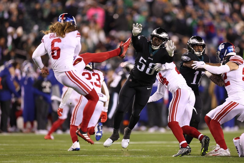 Kyron Johnson, #58 of the Philadelphia Eagles, pressures Jamie Gillan, #6 of the New York Giants, at Lincoln Financial Field on Jan. 8, 2023, in Philadelphia, Pennsylvania.