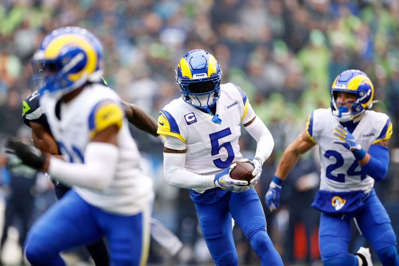 Jalen Ramsey #5 of the Los Angeles Rams intercepts a pass against the Seattle Seahawks during the first quarter at Lumen Field on January 08, 2023 in Seattle, Washington.