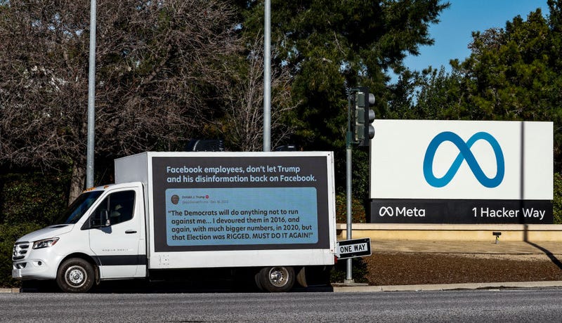 A mobile billboard, deployed by Accountable Tech, is seen outside the Meta Headquarter on January 17, 2023 in Menlo Park, California. Accountable Tech, an advocacy nonprofit, has deployed the mobile billboards as Meta considers reinstating Donald Trump’s Facebook page after a two-year suspension since the Capital insurrection. The billboards highlight Trump’s recent posts on Truth Social as a reason against reinstatement. (Photo by Kimberly White/Getty Images for Accountable Tech)
