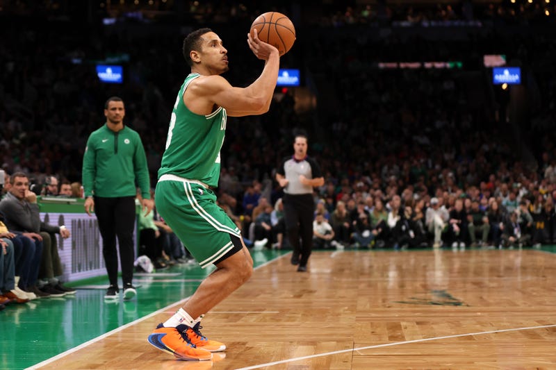 Malcolm Brogdon #13 of the Boston Celtics takes a shot against the Golden State Warriors during the first half at TD Garden on January 19, 2023 in Boston, Massachusetts.