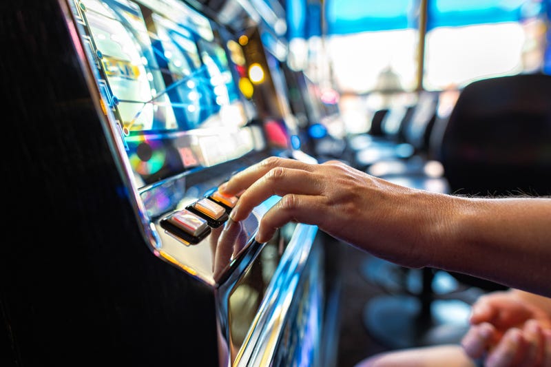 Person playing slot machine