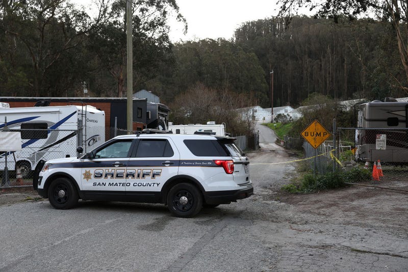 A San Mateo County sheriff deputy blocks the entrance to a farm following a mass shooting on January 24, 2023 in Half Moon Bay, California. 