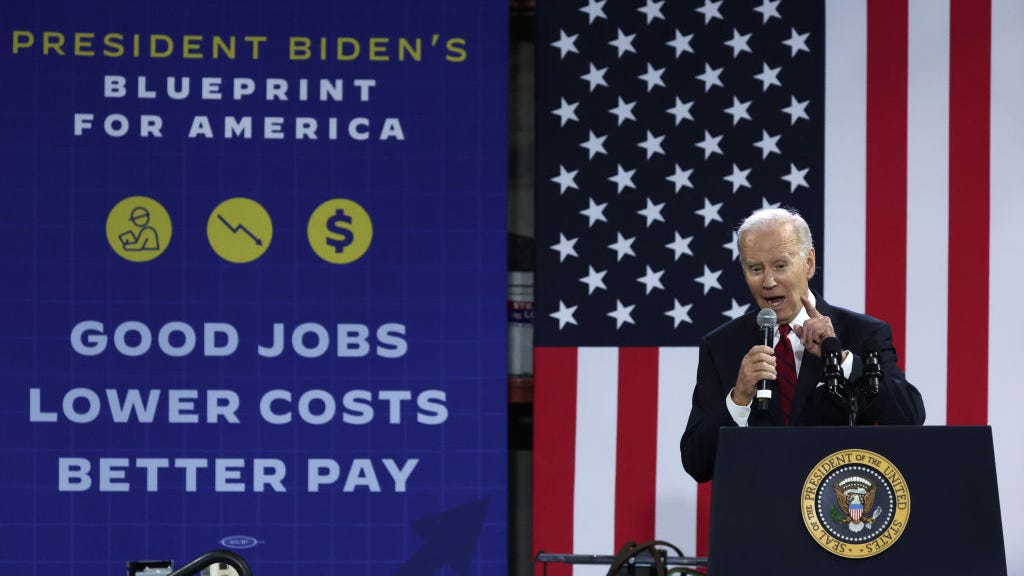 Biden tells a crowd that wages are up, inflation is down