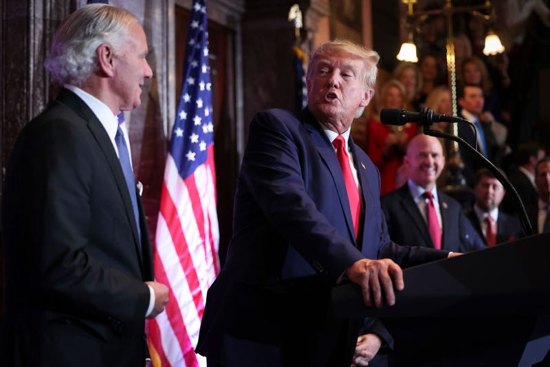 Former U.S. President Donald Trump delivers remarks with South Carolina Gov. Henry McMaster (L) at the South Carolina State House on January 28, 2023 in Columbia, South Carolina. Trump's visit to South Carolina marks his first visit to the state since announcing his intention to seek the presidency for a second term in 2024. (Photo by Win McNamee/Getty Images)