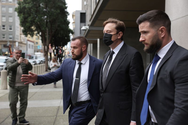 Tesla CEO Elon Musk (C) leaves the Phillip Burton Federal Building on February 03, 2023 in San Francisco, California. Closing arguments have wrapped up in the trial where investors are suing Tesla and Elon Musk, its chief executive officer, over his August 2018 tweets where he said he was taking Tesla private with funding that he secured. The tweet was found to be false and cost shareholders billions of dollars when Tesla's stock price began to fluctuate wildly allegedly based on the tweet. (Photo by Justin Sullivan/Getty Images)