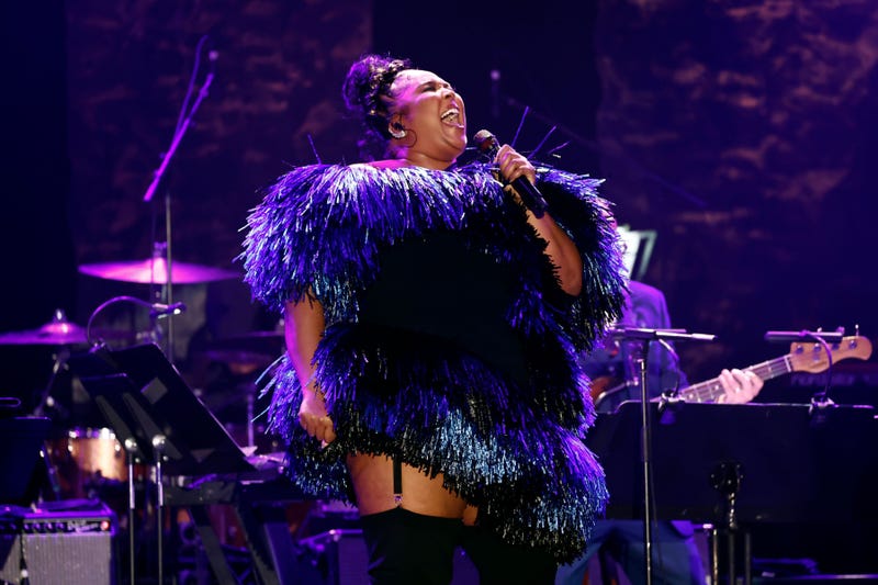 Lizzo performing on stage