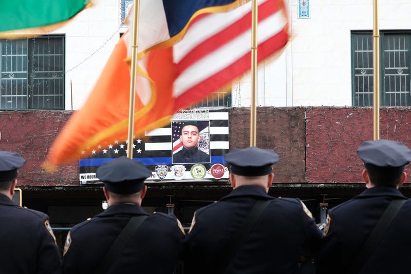 A picture of fallen NYPD police officer Adeed Fayaz is displayed outside of a mosque on Coney Island Avenue during his funeral on February 09, 2023 in the Brooklyn borough of New York City.