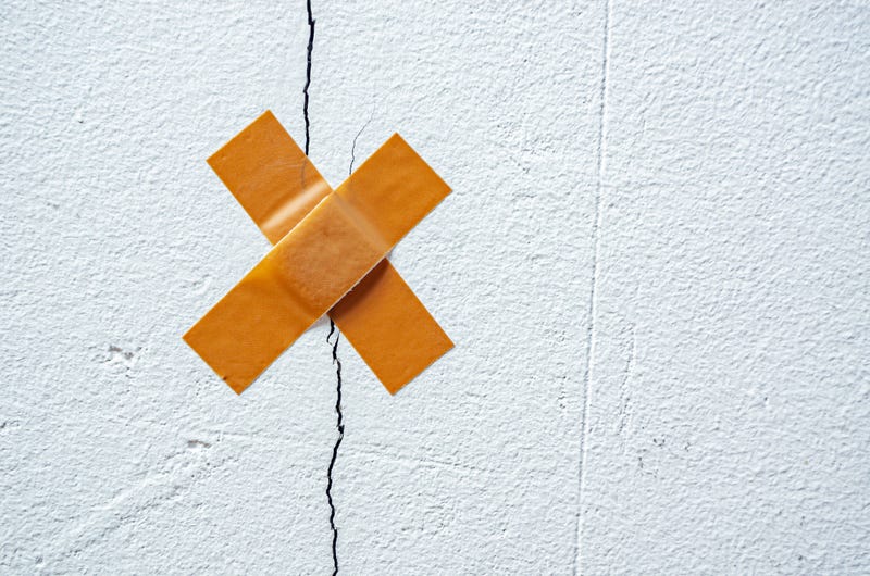 Crack in wall, with bandage