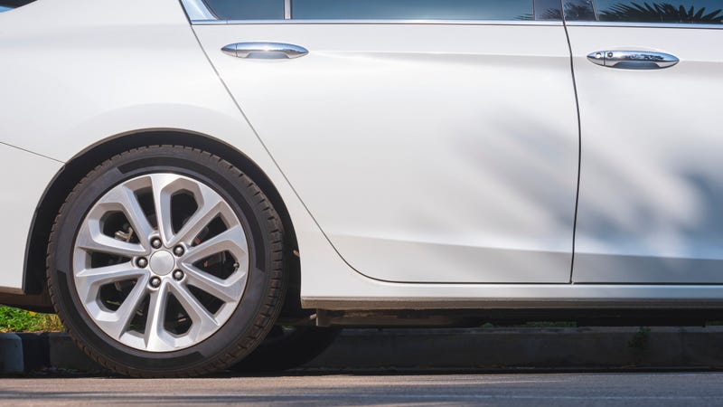 Closeup of a back car tire. 