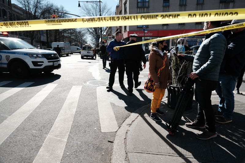 Police block off a street in Bay Ridge after a man drove a U-Haul truck into pedestrians on Feb. 13, 2023