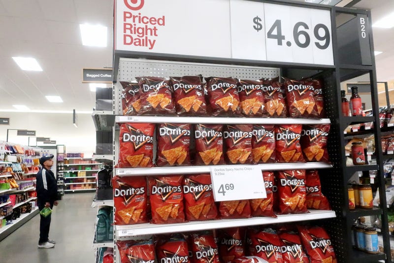 A person shops near a display of Doritos in a Target store on February 13, 2023 in Los Angeles, California. 