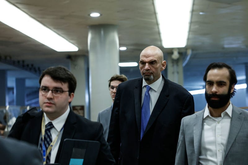 Sen. John Fetterman (D-PA) walks to a closed-door, classified briefing for senators at the U.S. Capitol building on Feb. 14, 2023.