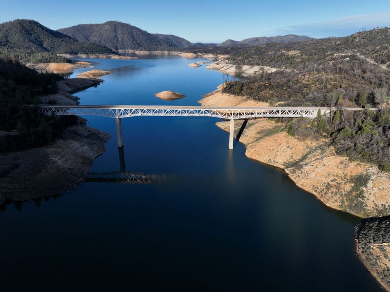 In an aerial view, the Enterprise Bridge traverses Lake Oroville on February 14, 2023 in Oroville, California.