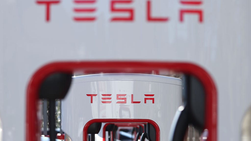 Tesla crashes into stationary firetruck, as US regulators investigate the trend