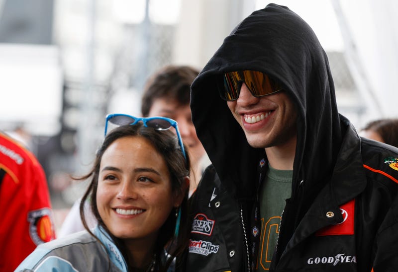 Pete Davidson and girlfriend Chase Sui  attend a tour prior to the NASCAR Cup Series 65th Annual Daytona 500 at Daytona International Speedway on February 19, 2023 in Daytona Beach, Florida. 