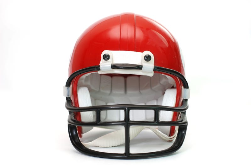 Red American football helmet isolated on white background