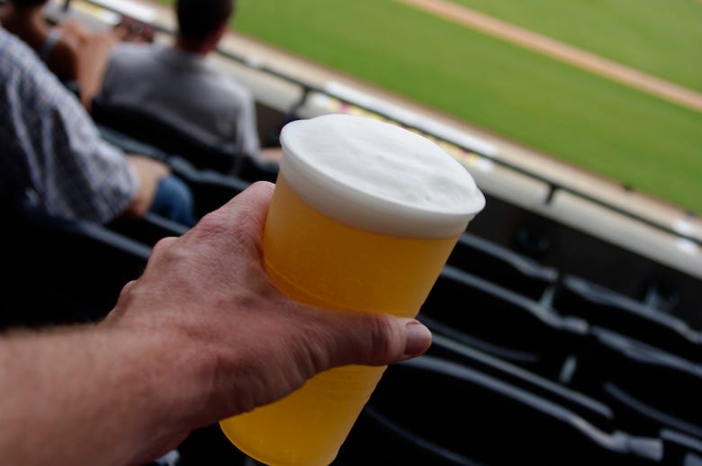 Frosty beer at a baseball game