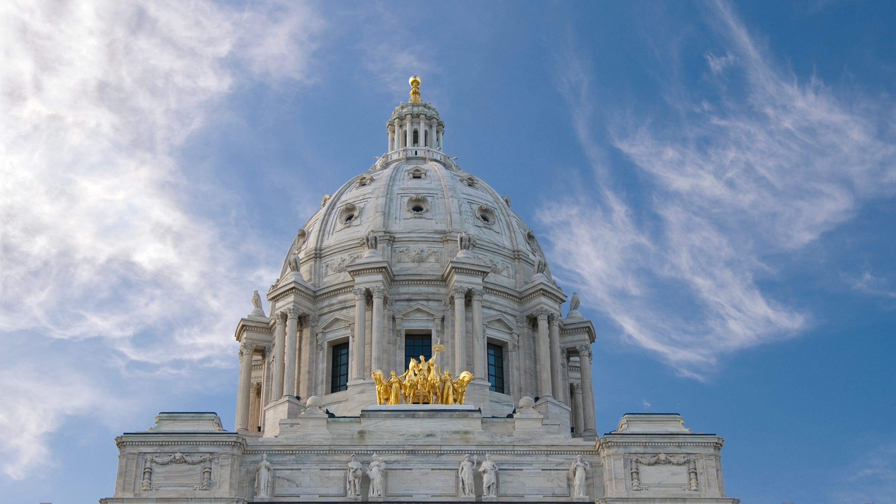 Members of Minnesota’s POCI caucus celebrate their accomplishments in the latest legislative session