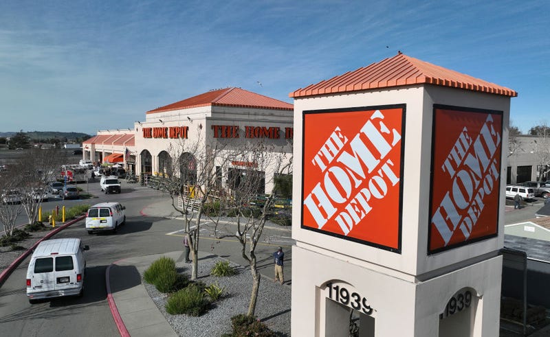 In an aerial view, a sign is seen posted on the exterior of a Home Depot store on February 21, 2023 in El Cerrito, California. 