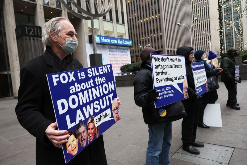 Members of Rise and Resist participate in their weekly "Truth Tuesday" protest at News Corp headquarters on February 21, 2023 in New York City.