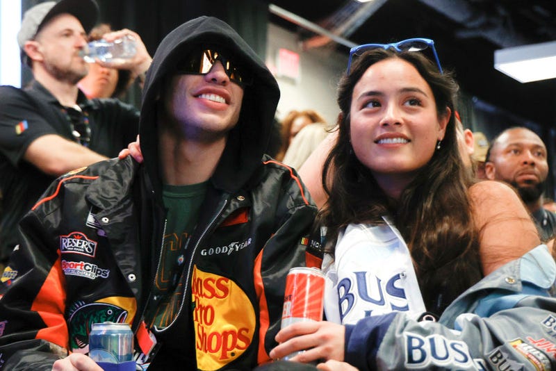 Pete Davidson and Chase Sui attend the drivers meeting prior to the NASCAR Cup Series 65th Annual Daytona 500 at Daytona International Speedway on February 19, 2023 in Daytona Beach, Florida. 