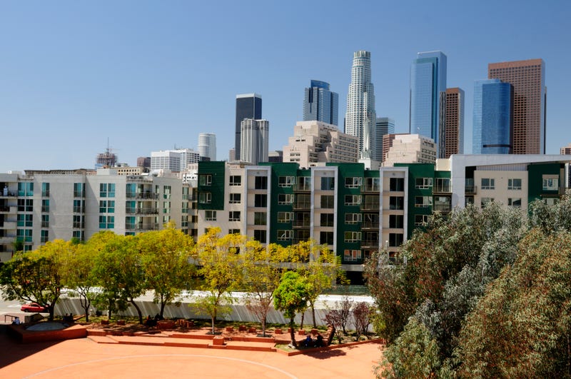 apartment buildings with downtown la buildings in background