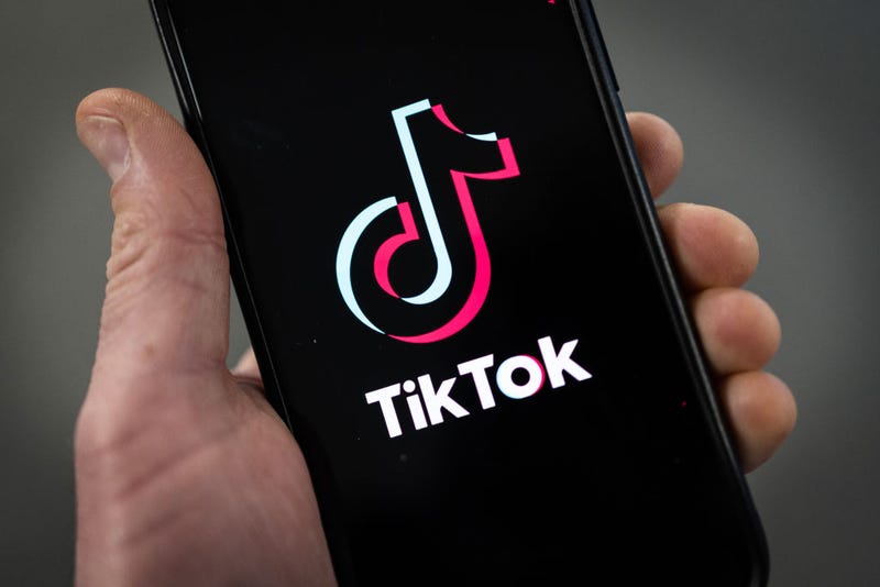 In this photo illustration, a TikTok logo is displayed on an iPhone on February 28, 2023 in London, England. This week, the US government and European Union's parliament have announced bans on installing the popular social media app on staff devices. (Photo by Dan Kitwood/Getty Images)