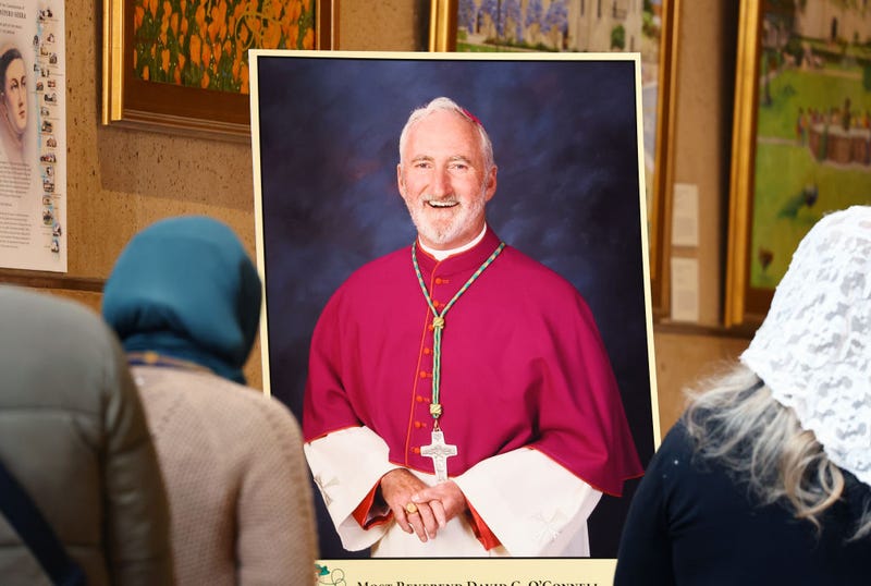 Mourners wait in line to attend the public viewing for Archdiocese of Los Angeles Auxiliary Bishop David G. O'Connell, part of three days of memorial services, at the Cathedral of Our Lady of the Angels on March 2, 2023 in Los Angeles, California.