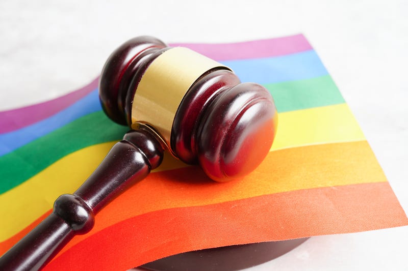 Stock image of gavel and rainbow flag
