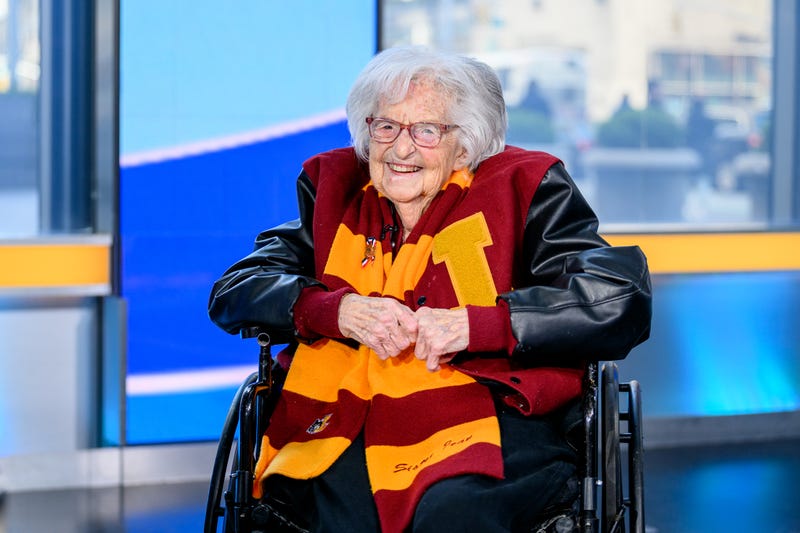 Sister Jean in wheelchair on TV set