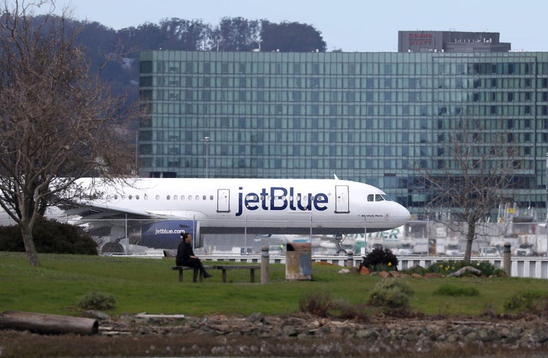 A JetBlue Airways plane prepares to take off from San Francisco International Airport on March 07, 2023 in San Francisco, California. The U.S. Justice Department has sued to block JetBlue Airways proposed $3.8 billion takeover of Spirit Airlines to prevent industry consolidation.