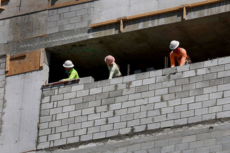Construction workers on a job site on March 10, 2023 in Miami, Florida. A report released by the Bureau of Labor Statistics showed the US economy added 311,000 jobs in February. The unemployment rate ticked up to 3.6% from 3.4%. (Photo by Joe Raedle/Getty Images)