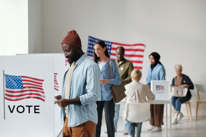 FILE: Voters fill out ballots.