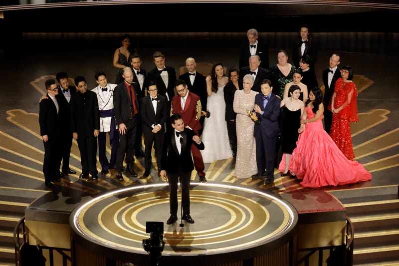 Jonathan Wang accepts the Best Picture award for "Everything Everywhere All at Once" along with cast and crew onstage during the 95th Annual Academy Awards at Dolby Theatre on March 12, 2023 in Hollywood, California.