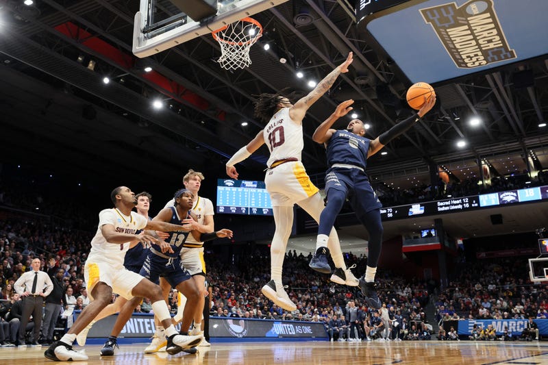 Darrion Williams #5 of the Nevada Wolf Pack shoots the ball against Frankie Collins #10 of the Arizona State Sun Devils during the first half in the First Four game of the NCAA Men's Basketball Tournament at University of Dayton Arena on March 15, 2023 in Dayton, Ohio. 