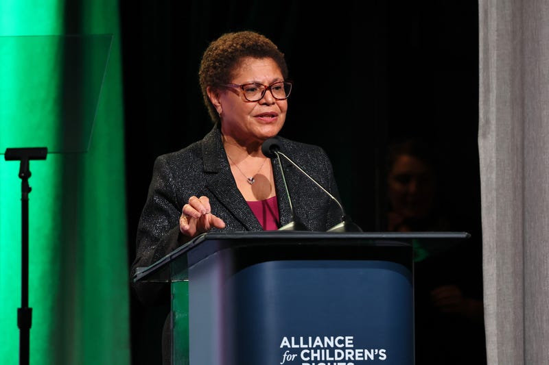karen bass speaks at podium