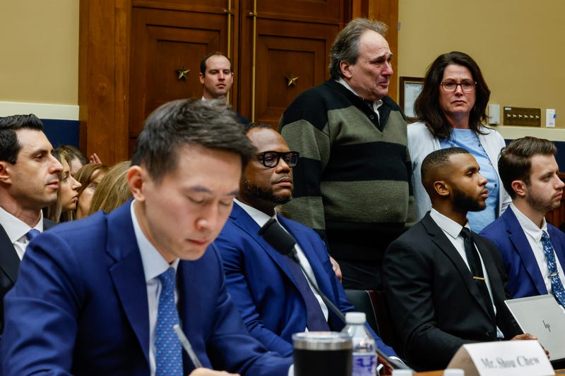 Dean and Michelle Nasca, who filled a lawsuit against Tik Tok and Bytedance Inc. for the death of there son Chase Nasca, stand as Rep.Kat Cammack (R-FL) speaks to TikTok CEO Shou Zi Chew on March 23.