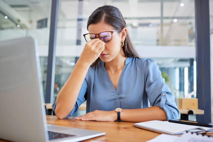 Worker stressed out from their job. 