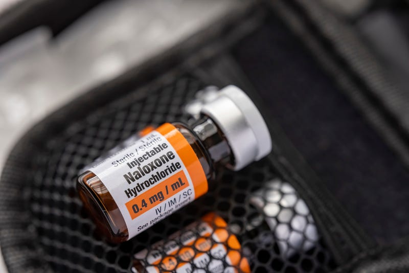 A a few Naloxone vials inside a kit stock photo