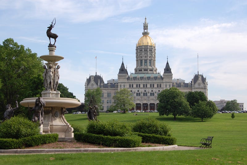 Hartford, Connecticut state capitol building photographed from Bushnell Park. The historic Corning Fountain is in the foreground.