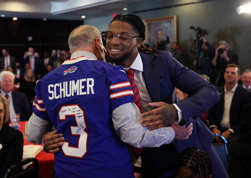 Chuck Schumer and Damar Hamlin