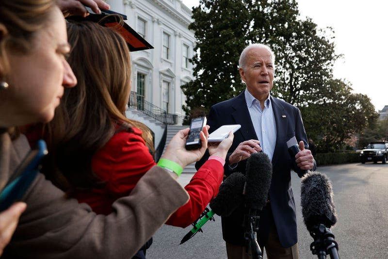 President Joe Biden declines to comment after reporters question him about the criminal indictment of former President Donald Trump