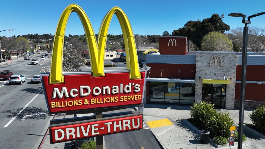 Why is McDonald's laying people off in a profitable year?