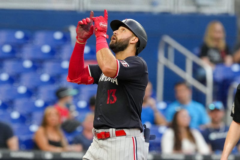 Joey Gallo #13 of the Minnesota Twins points to the sky after hitting a home run in the second inning against the Miami Marlins at loanDepot park on April 03, 2023 in Miami, Florida.