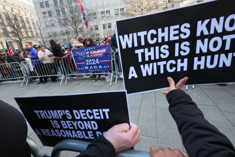 Supporters of former President Donald Trump and counter-protestors are separated as they hold rallies at Collect Pond Park near the courthouse ahead of his arraignment hearing on April 04, 2023 in New York City. 