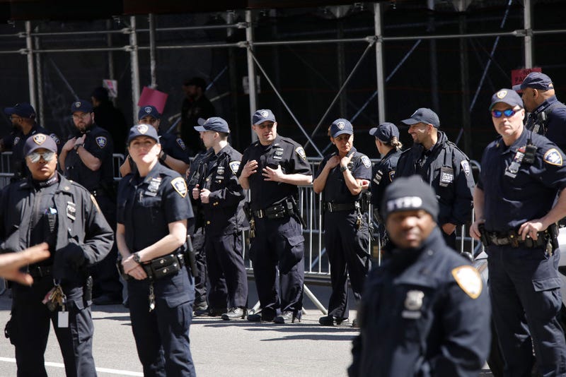 NYPD officers gather outside the Manhattan Criminal Courthouse on April 04, 2023 in New York City.