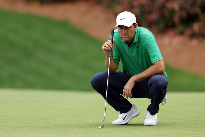 Scottie Scheffler looks over a putt on the 13th green during the first round of the 2023 Masters Tournament at Augusta National Golf Club on April 06, 2023 in Augusta, Georgia.